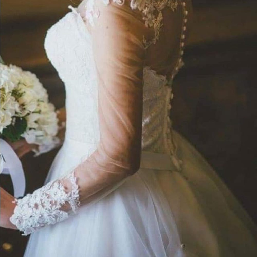 Maggie Sottero long sleeve lace pearls wedding dress